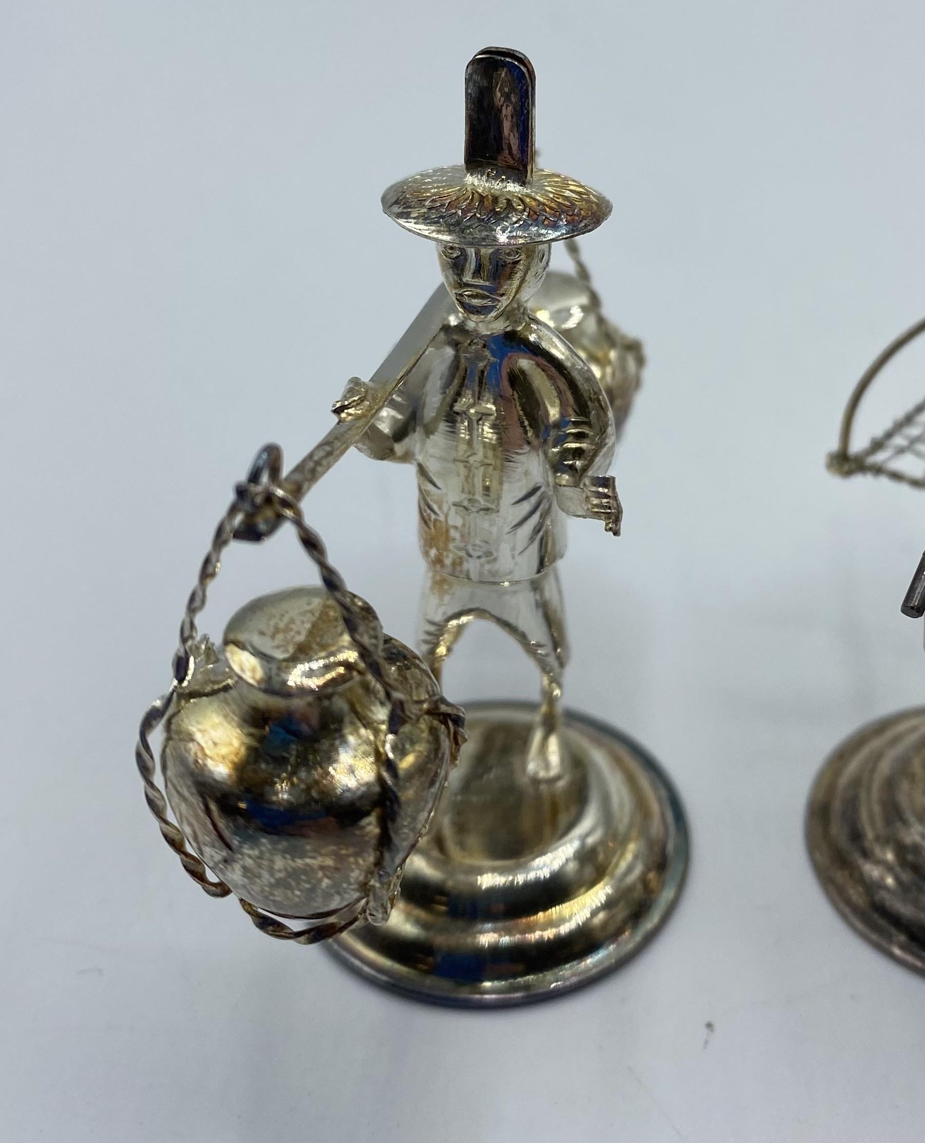A set of 10 Hong Kong Sterling silver figures of gentlemen carrying baskets. together with a - Image 6 of 10