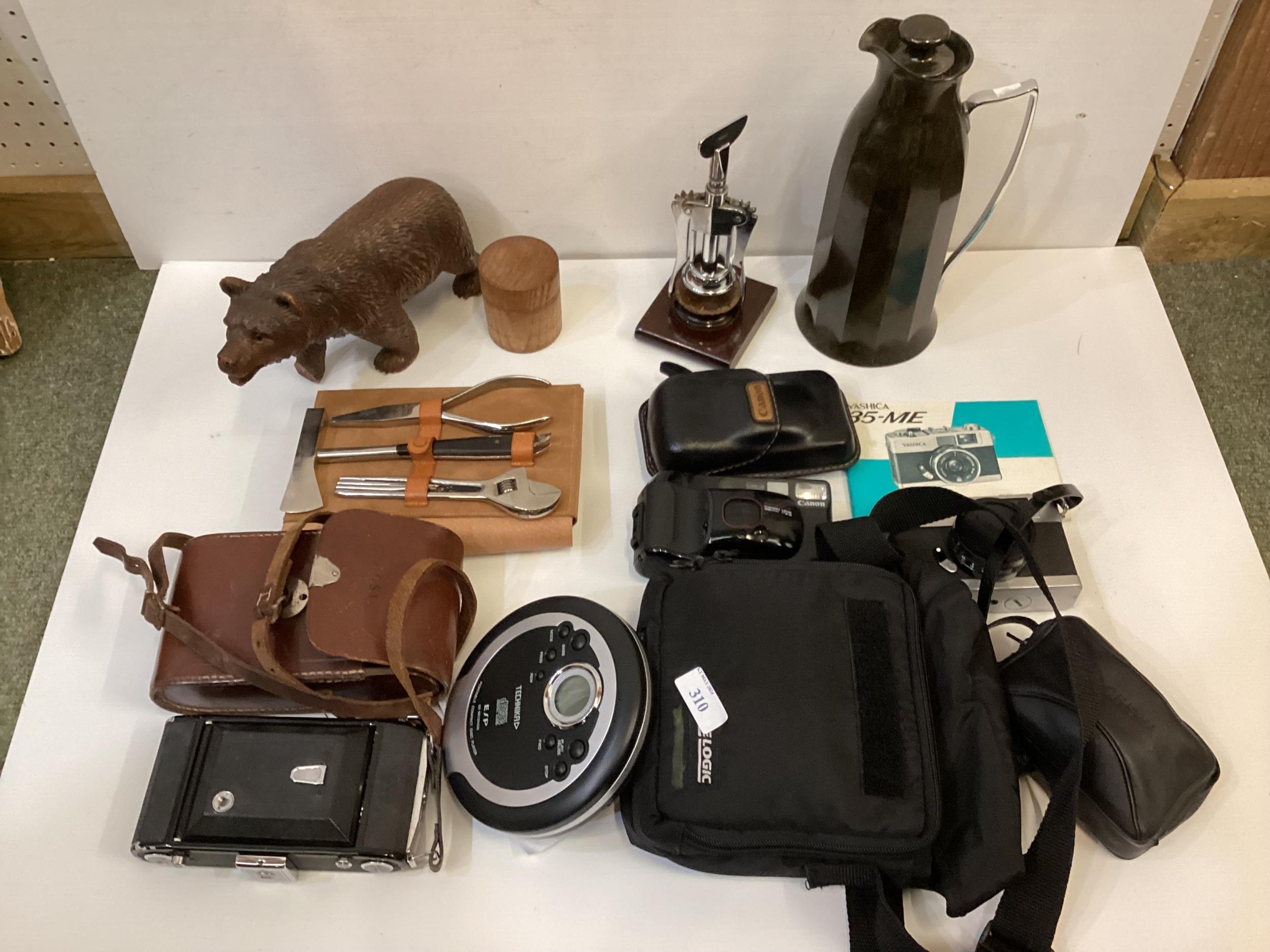 A quantity of Vintage Cameras, a vintage leather cased tool set, thermos, bottle/wine opener etc