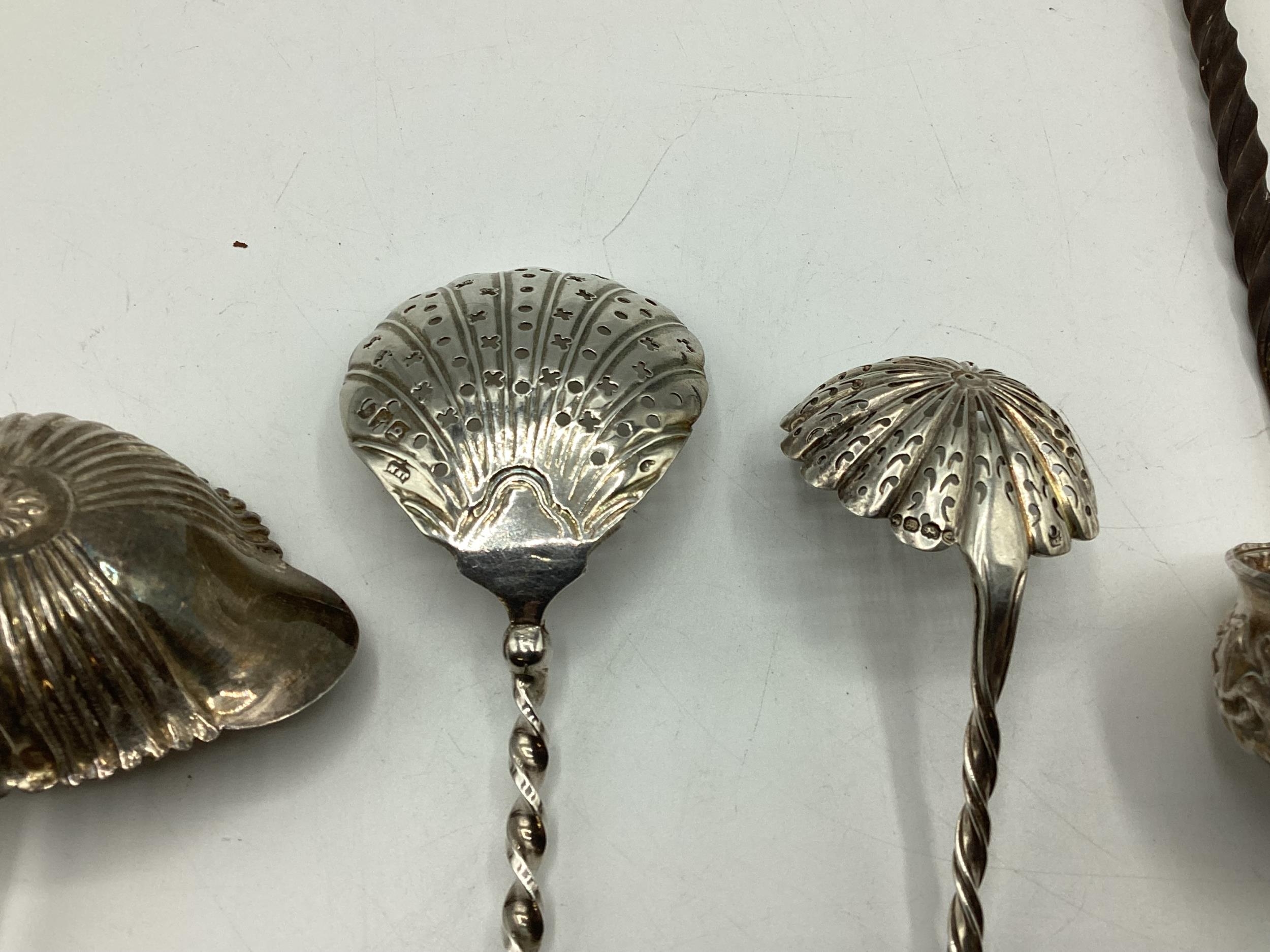 An unmarked white metal coin set toddy ladle with twisted horn/bone handle together with another - Image 4 of 5