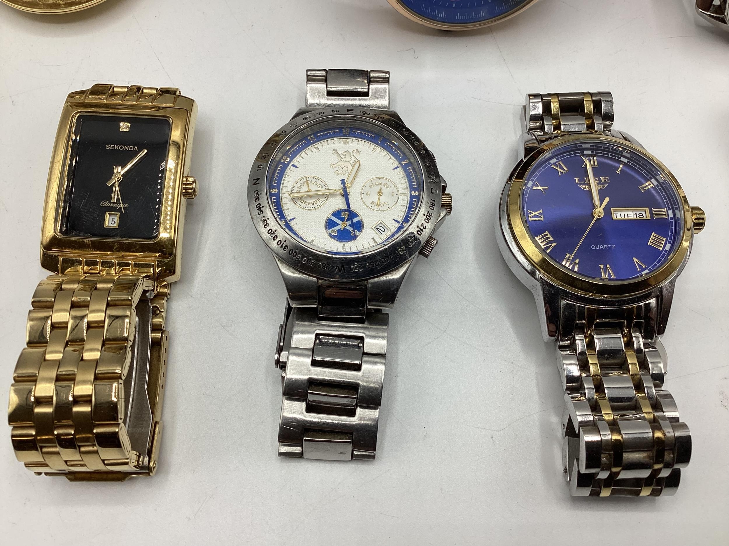 A collection of High St and fashion watches together with a yellow metal full hunter pocket watch. - Image 2 of 6