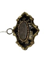 An unmarked yellow metal and black enamel mourning Brooch with woven hair panel to centre, with gold