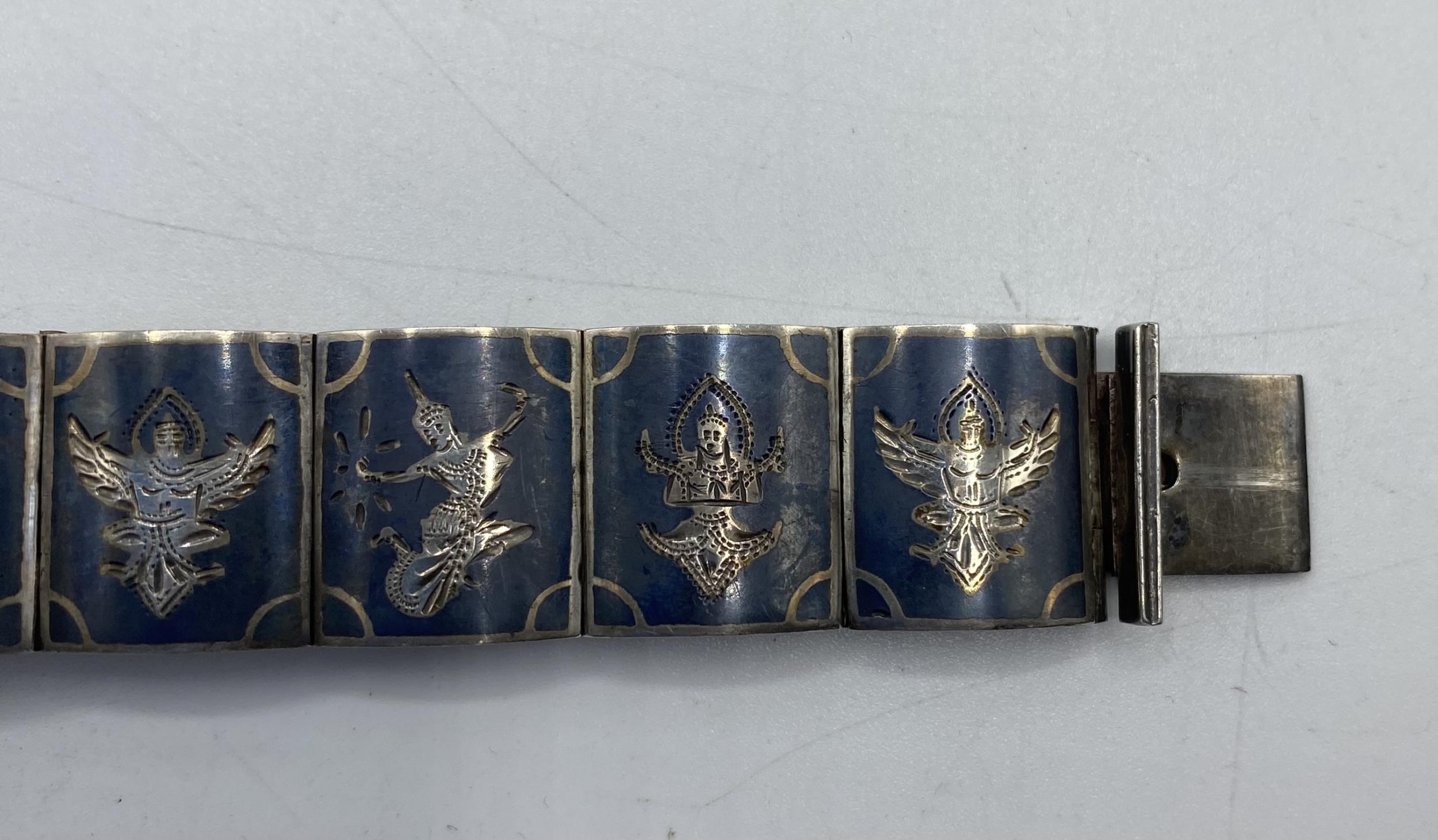 A Japanese Cloisonné belt buckle, Meiji Period together with a Siam silver panel bracelet. - Image 3 of 5