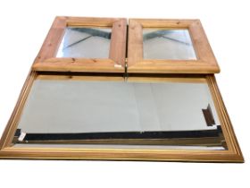 A quantity of hanging wall mirrors