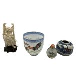 A collection of Oriental items to include a Ching dynasty blue and white pot, a glass inro and other