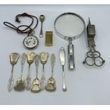 A Hallmarked silver dressing table set to include four brushes and glass bottles with hallmarked