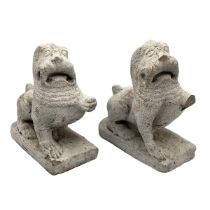 A pair of reconstituted stone temple dogs with white over paint, as found, Provenance: Fawley