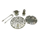 A collection of sterling silver items to include an ashtray and teapot stand, gross weight 560 g