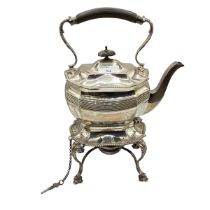 A sterling silver teapot on a sterling stand with a sterling silver burner, Elkington and Co Ltd,