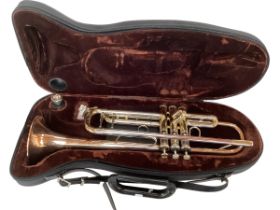 A modern trumpet, in case. Labelled to trumpet MIRAGE
