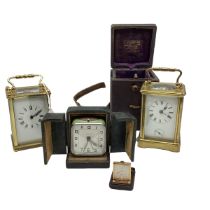 A French gilt brass repeating carriage alarm clock. Movement stamped Aid de le Reveil. In original