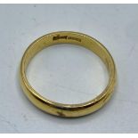 A 22ct gold wedding Band. 4.11g. Size O.