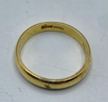 A 22ct gold wedding Band. 4.11g. Size O.