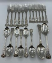 A sterling silver six person service , Elkington and Co, James Dixon and son in the Kings pattern.
