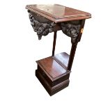 A mahogany and mirrored back side table, with carved frieze to drawer, as found 80cm H x 43cm W