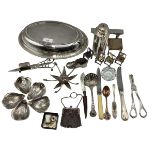 A collection of unmarked white metal items to include wick scissors, dolls house furniture and other