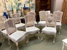 A set of 8 good modern French style painted dining chairs, with bergere cane backs, and cream/grey