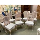 A set of 8 good modern French style painted dining chairs, with bergere cane backs, and cream/grey