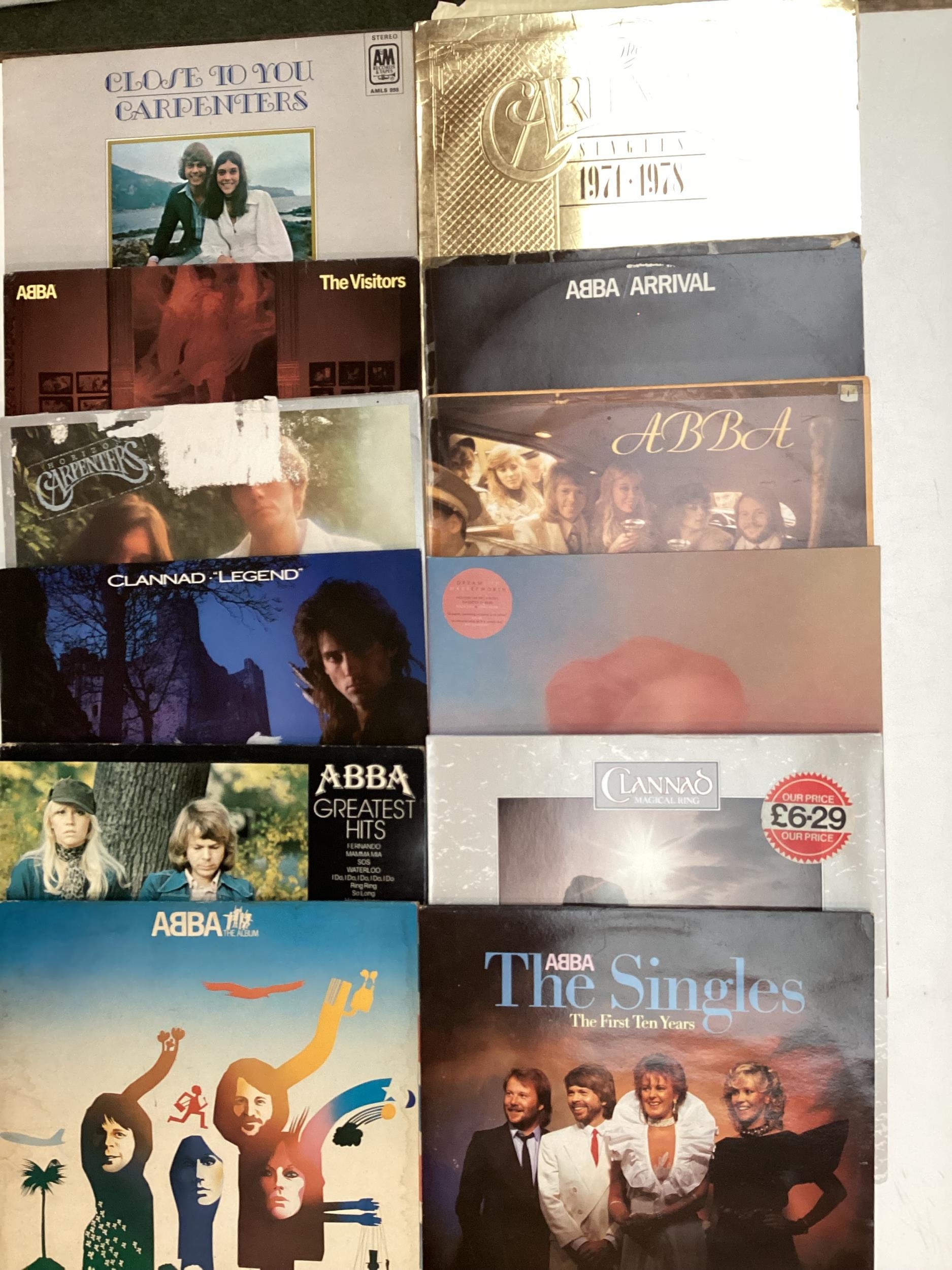 Vinyl records, circa 12. TO include Abba, The Carpenters. See photos for album covers. Condition