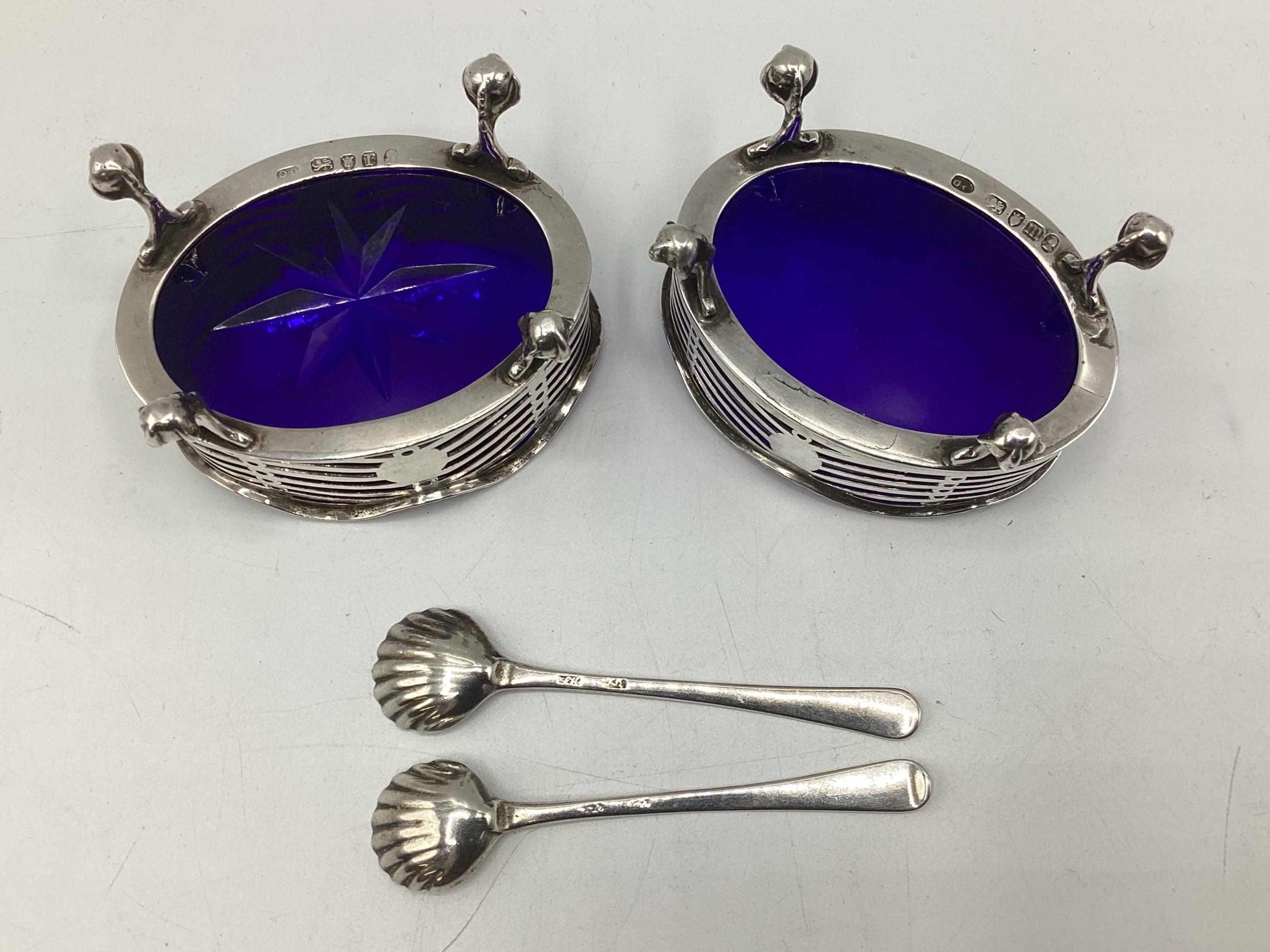 A pair of oval sterling silver salts with blue glass liners, GC London, George Chebsey, with - Image 2 of 2