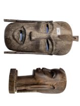 Two african tribal carvings of faces