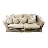 Large good quality sofa khaki coloured loose covers. Condition commensurate with use. 202 cm W