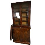 A Victorian mahogany glazed bookcase, with two door cupboard with shelves to base, 231cmH x 103cmW x