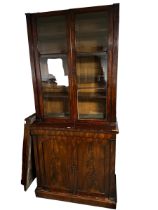A Victorian mahogany glazed bookcase, with two door cupboard with shelves to base, 231cmH x 103cmW x