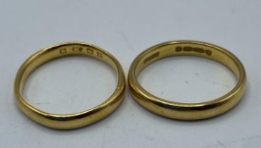 Two 22ct gold wedding bands, 5.6g, size L and size K.