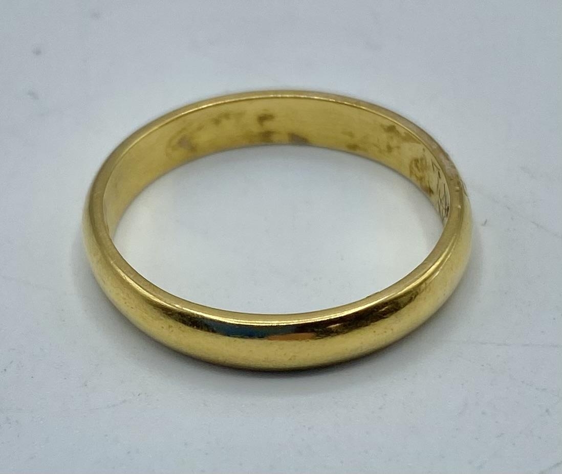A 22ct gold wedding Band. 4.11g. Size O. - Image 2 of 2