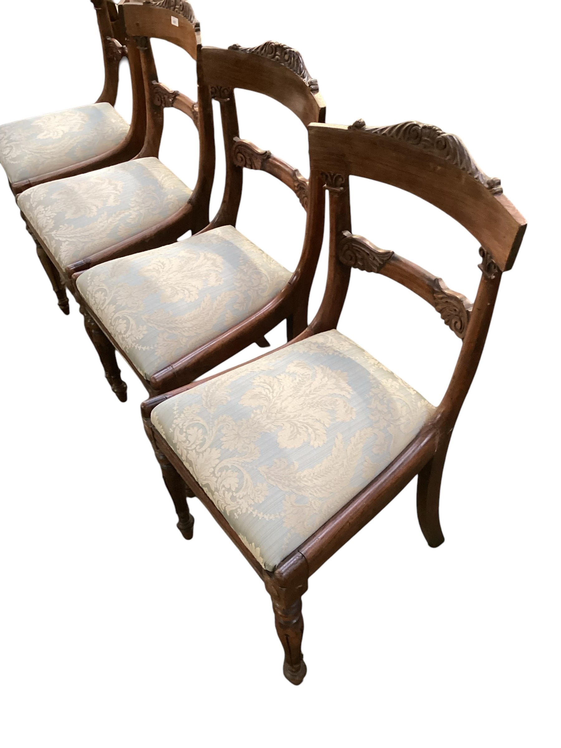 A set of 4 William IV Rosewood dining chairs, with drop in blue upholstered seats; Prov: Fawley