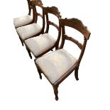 A set of 4 William IV Rosewood dining chairs, with drop in blue upholstered seats; Prov: Fawley