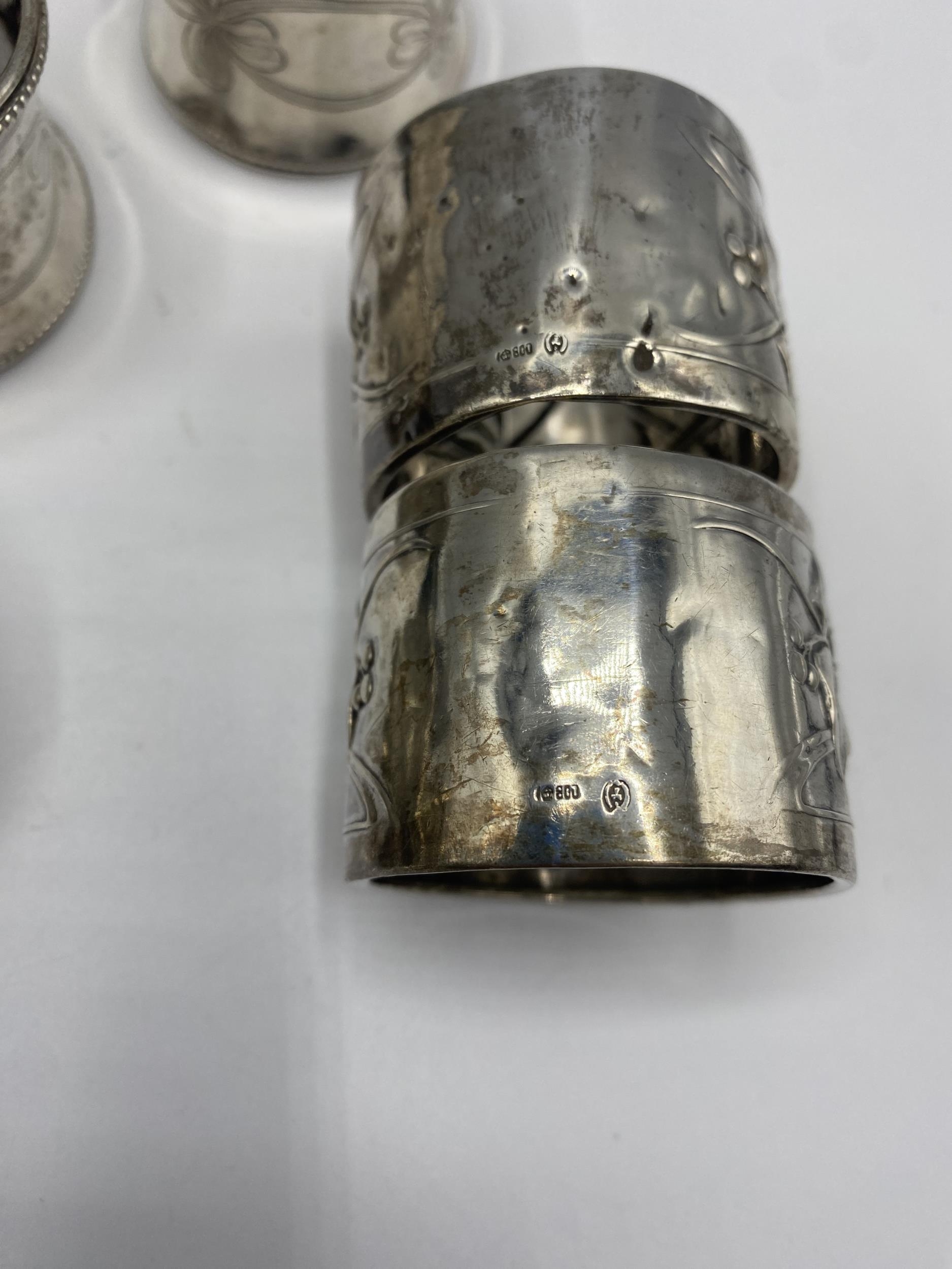 A collection of sterling silver items to include napkin rings , picture frames condiments etc. Gross - Image 6 of 15