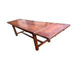 A heavy rustic oak draw leaf refectory table, and two drawers to one side. Dimensions 85cms wide,