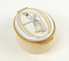 W.G. Grace. Modern enamelled oval white and cream pillbox hand decorated with a portrait of Grace in