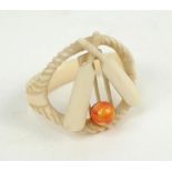 Cricket napkin ring. Attractive ivory/bone napkin ring with stumps and crossed bats with red ball to