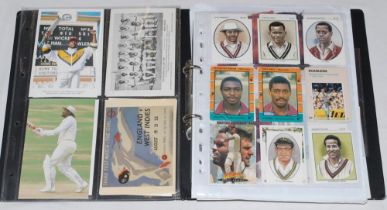 West Indies cricketer postcards and collectors cards. Black binder comprising a mixed selection of