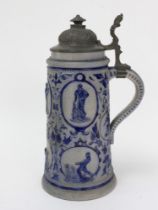 Westerwald stoneware cricket stein, moulded in relief with eight cameo panels of a batsman,