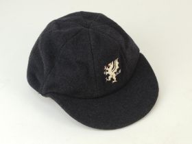 Somerset navy blue county 1st XI cricket cap with county emblem to front. The cap by Dege of