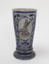 Westerwald stoneware cricket beaker, moulded in relief with three cameo panels of a batsman, after