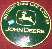 A reproduction cast iron plaque for John Deere, dia.24cm