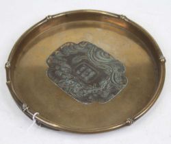 A 19th century circular cast bronze tray, nine character central cartouche surrounded by a dragon,