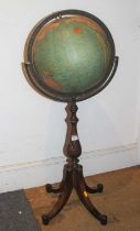 An early 20th century 12" terrestrial floor globe, bearing a label for Kittinger Company on baluster