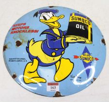 An enamel Sunoco Oil advertising sign, dia.30cm Reproduction.