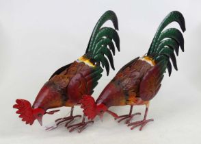 A pair of painted pressed metal models of cockerels, height 29cm