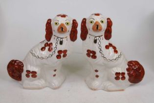 A pair of Arthur Wood pottery models of spaniels, each h.29cm