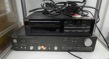 A Technics amplifier SU-V4X; together with a Philips CD player (2)