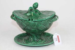 A green glazed tureen, relief decorated with foliage and having an acorn finial, h.16cm Ladle is