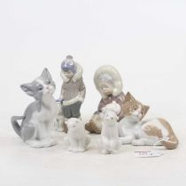 Two Lladro porcelain models of kittens, the largest h.13cm; together with two Lladro models of