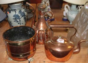 A Victorian copper range kettle, h.28cm; together with a brass and copper jardiniere; and a Middle