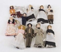 A collection of miniature china dolls, with fabric bodies, the largest h.15cm